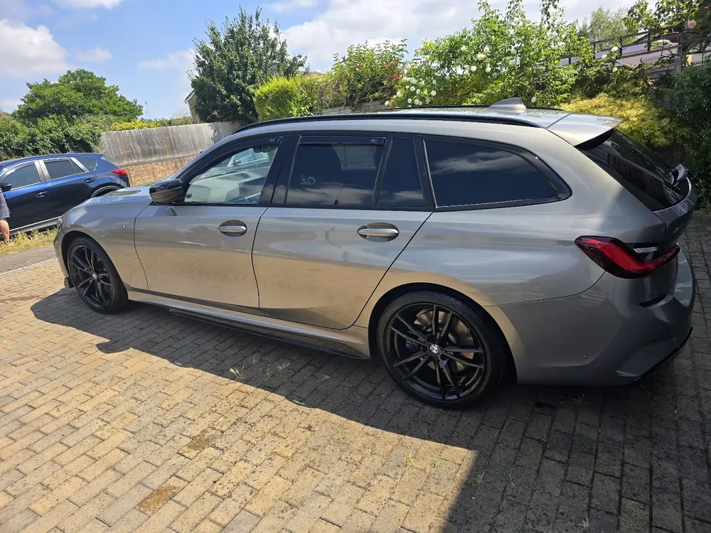 BMW 3 Series Touring after the valet, photographed by Melissa B.