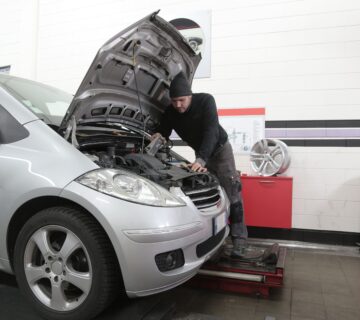 mechanic checking out a car coming out of lockdown