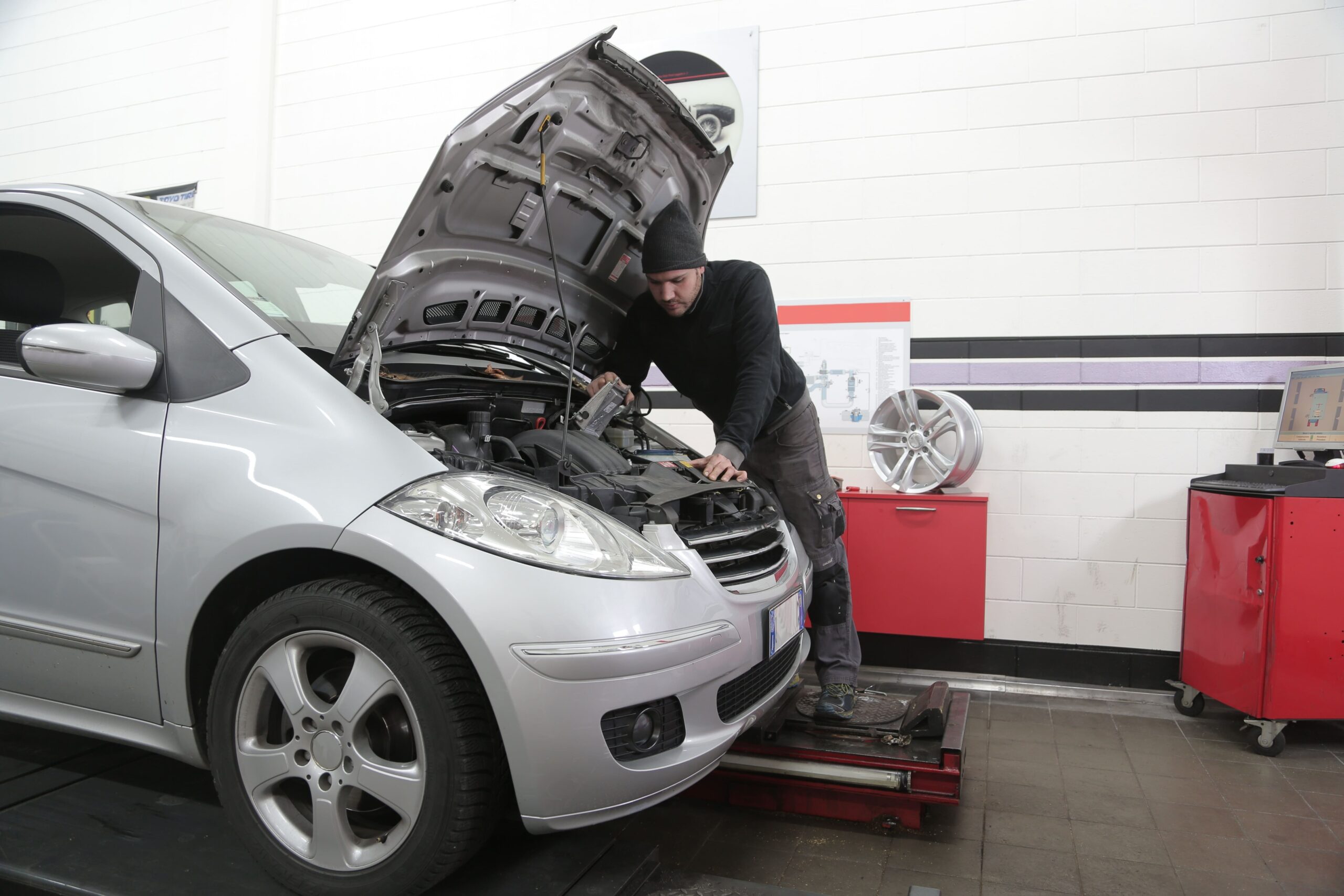 mechanic checking out a car coming out of lockdown