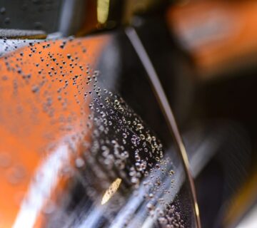 time to spring clean your car - image of car with water droplets