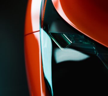 Close up section of a shiny red car