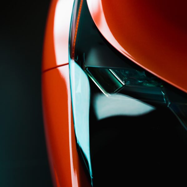 Close up section of a shiny red car