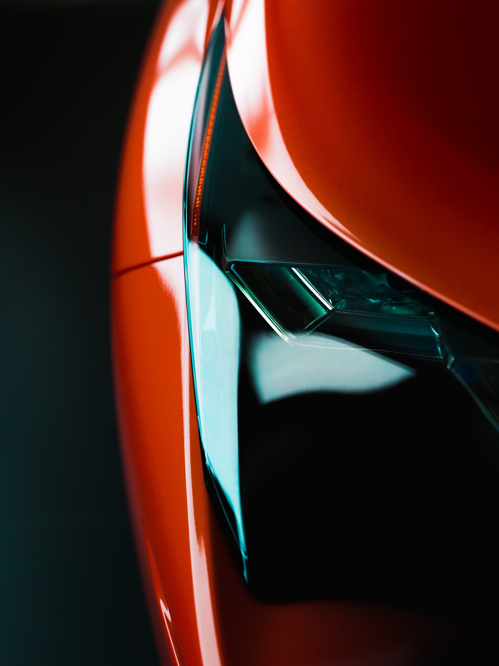 Close up section of a shiny red car